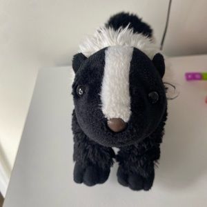 Soft and cuddly Skunk Plushie